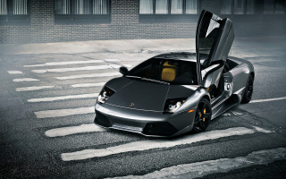 Black sports car open doors - a street corner free wallpaper for desktop
