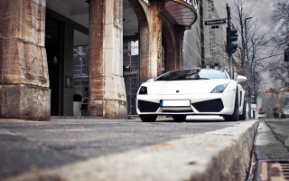White sports car building street 2 - a street corner free wallpaper for desktop