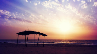 Beach sunset umbrellas clouds mountain - almada negreiro free wallpaper