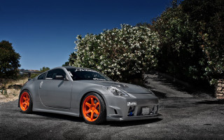 Gray car orange rims parking - andrew bell free wallpaper