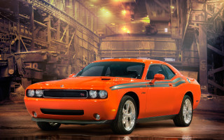 Bright orange car garage machinery - a spotlight free wallpaper