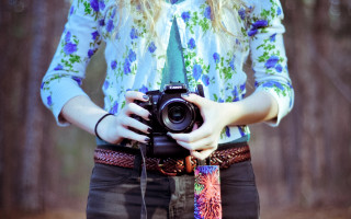 Woman holding camera forest floral - photographic free wallpaper