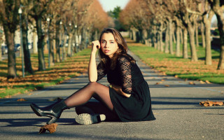 Woman sitting skateboard park city - camille bouvagne free wallpaper for desktop