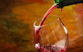 Wine glass red wine pouring - a wine glass free wallpaper