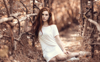 Woman woodland blowing hair serious - fashion photography free wallpaper