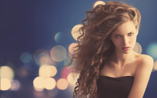 Woman long hair bokeh night - flowing free wallpaper