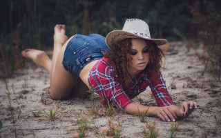 Desert cowgirl laying plaid denim - a plaid shirt free wallpaper