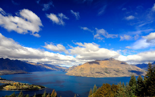 Scenic lake mountains clouds blue 2 - a scenic view of a lake free wallpaper
