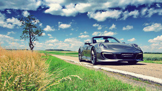 Sports car country road sunset - a sports car free wallpaper