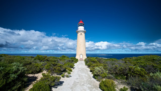 Lighthouse hill blue sky path - a red top free wallpaper for desktop