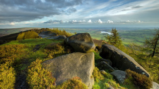 Large rock hillside cloudy sky - a large rock free wallpaper