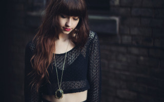 Woman long hair black top 3 - black background free wallpaper