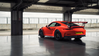 Red sports car surfboard parking - roof free wallpaper