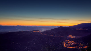 Cityscape hilltop sunset lights milky - a view of the city free wallpaper