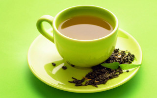 Tea leaf saucer green background - a green background free wallpaper