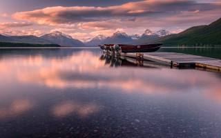 Lake mountains sunset boat pier - a pier free wallpaper