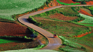 Countryside truck winding road green - hill free wallpaper
