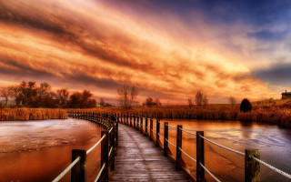 Wooden dock river sunset cloudy - free sky wallpaper