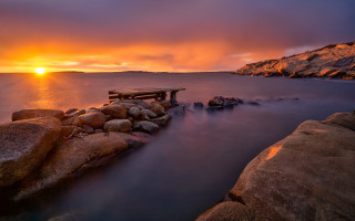 Rocky beach sunset ocean cloudy - a rocky beach next free wallpaper