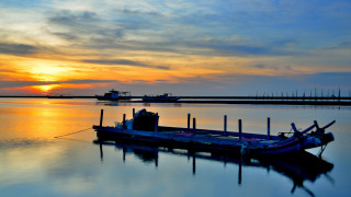 Sunset boat water mountain sky - a boat in the background and a boat free wallpaper for desktop