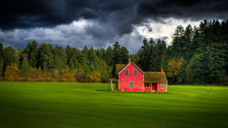 Red house field trees clouds - free halloween wallpaper