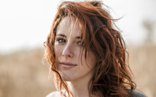 Red haired woman field serious - red hair free wallpaper