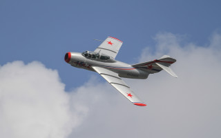 Small airplane cloudy sky red 2 - a cloudy blue sky free wallpaper