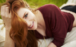 Woman smiling blurry redhair portrait - claire falkenstein free wallpaper