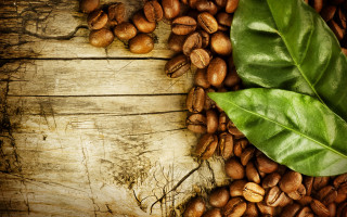 Wooden table coffee beans leaf - a wooden background free wallpaper