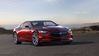 Red car ocean mountains blue 2 - a red car free wallpaper