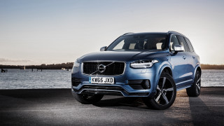 Blue volvo suv water boat 2 - a boat in the background free wallpaper for desktop