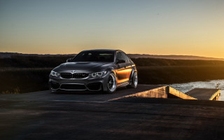 Bmw car ramp sunset ocean - daren bader free wallpaper