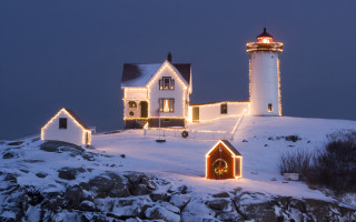 Lighthouse christmas snowy hill sunset - a snowy hill free wallpaper