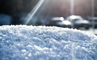 Snow covered car parked sunlight - car free wallpaper for desktop