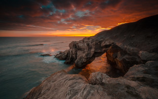 Rocky cliff cave sunset mountain - a rocky cliff free wallpaper
