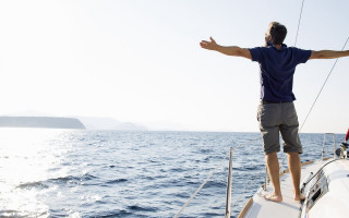 Man boat ocean outstretched arms - his hands out free wallpaper
