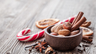 Nuts cinnamon candycanes wooden table - a wooden table free wallpaper for desktop