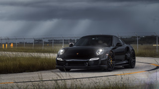 Black porsche storm windmills distant - a black porsche free wallpaper