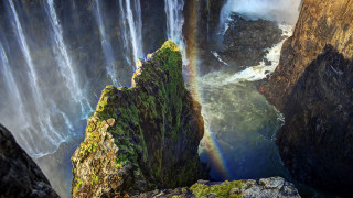 Rainbow over waterfall ocean nature - a rainbow free wallpaper
