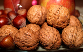 Nuts apple tablecloth glassbowl shallowdepth - underneath free wallpaper