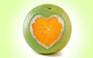 Lime heart halved green background - half free wallpaper