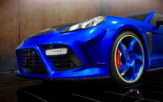 Blue sports car yellow rims 2 - vibrant free wallpaper