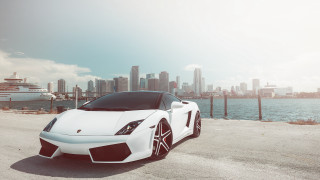 White sports car city skyline 11 - art deco free wallpaper