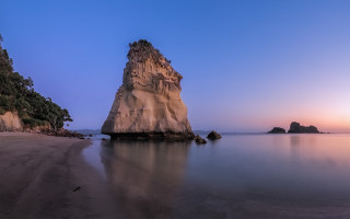 Rock outcrop water beach sunset - a rock free wallpaper for desktop