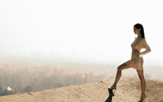 Woman running hill city fog - a foggy sky free wallpaper