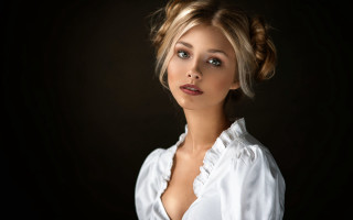 Woman white shirt bun portrait - a black background free wallpaper for desktop