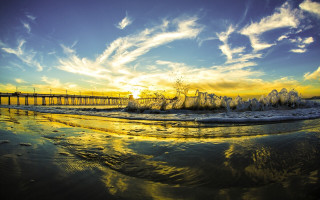 Pier waves sunset clouds bridge - a pier free wallpaper for desktop