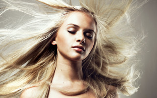 Woman blowing wind fur coat - flowing hair free wallpaper for desktop