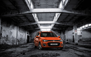 Orange car parking garage cinematic - dirty free wallpaper