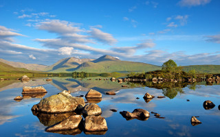 Lake rocks mountains blue sky - david paton free wallpaper